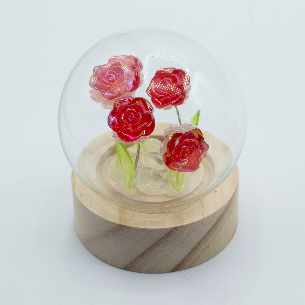 Decorazione luminosa sotto vetro – Rose rosse · a batterie